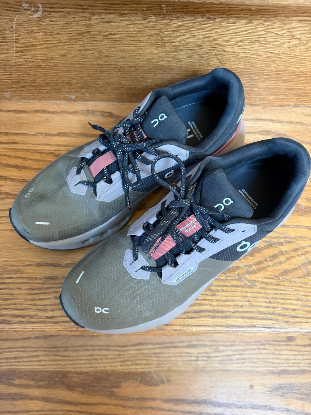 On Cloud Women’s Olive Green and Black Athletic Sneakers with Red Accents